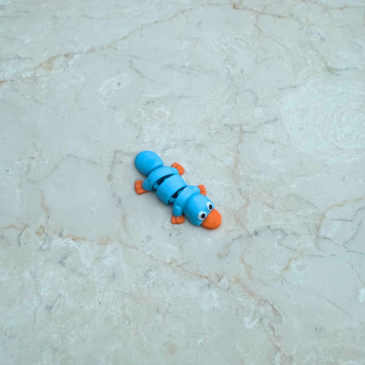 Uniek 3D geprint speelgoed vogelbekdier, ideaal voor fantasierijk spel en als verzamelobject.