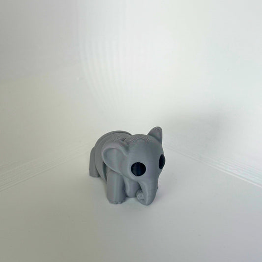 Articulated olifantenspeeltje in grijs PLA, perfect als duurzaam milieuvriendelijk speelgoed.