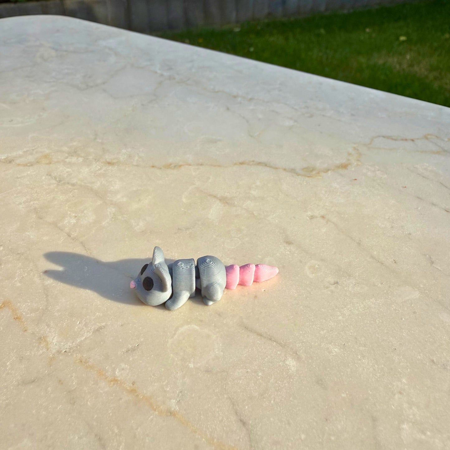 Duurzaam 3D geprint flexibel muisje van WereldjeMakers, eco-vriendelijk en veilig speelgoed.