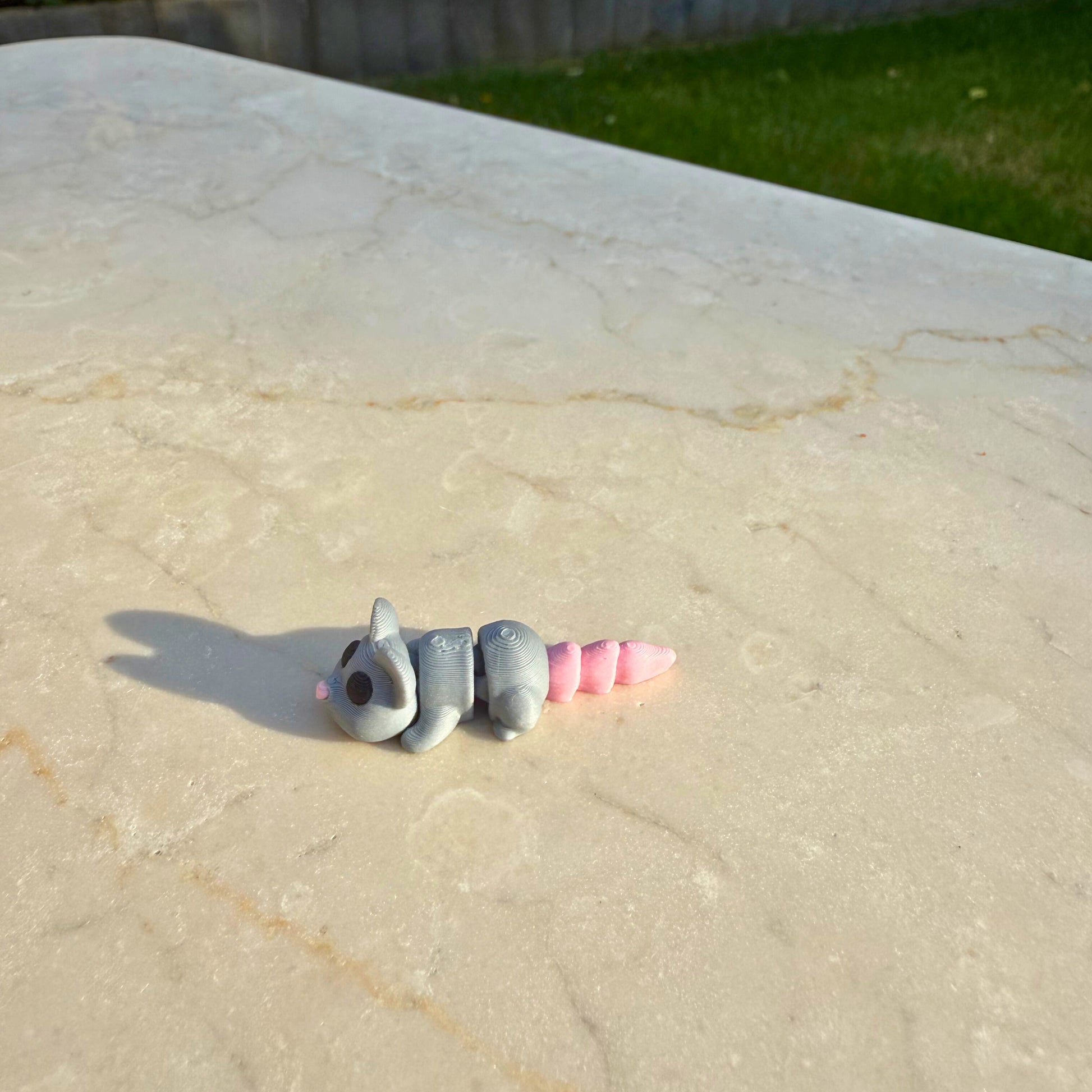 Duurzaam 3D geprint flexibel muisje van WereldjeMakers, eco-vriendelijk en veilig speelgoed.