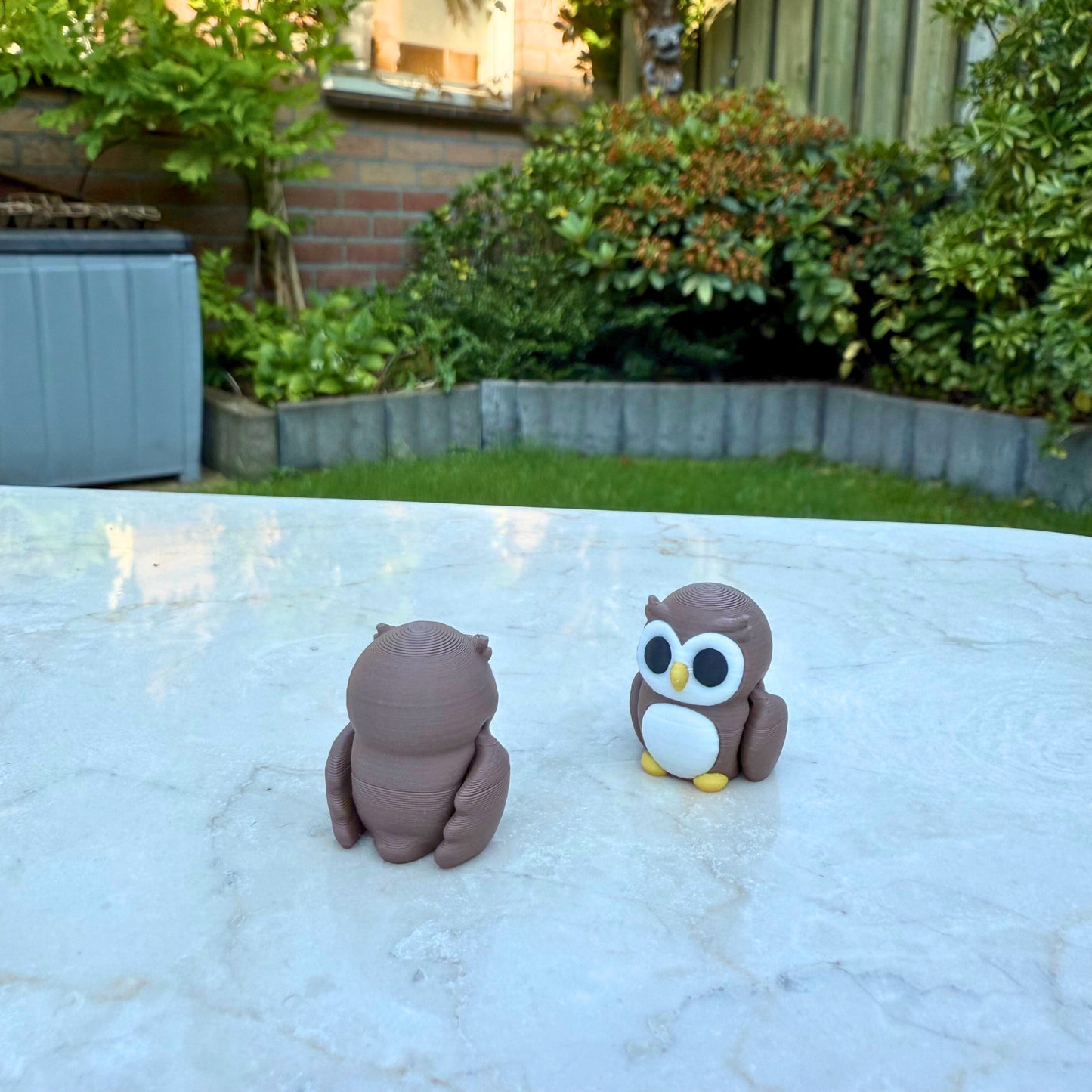 Detail van een 3D geprinte flexibele uil van WereldjeMakers, duurzaam en veilig speelgoed.