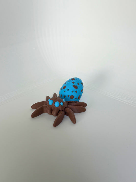 Articulated brown spider with bright blue spots on its back, displayed from a side angle.